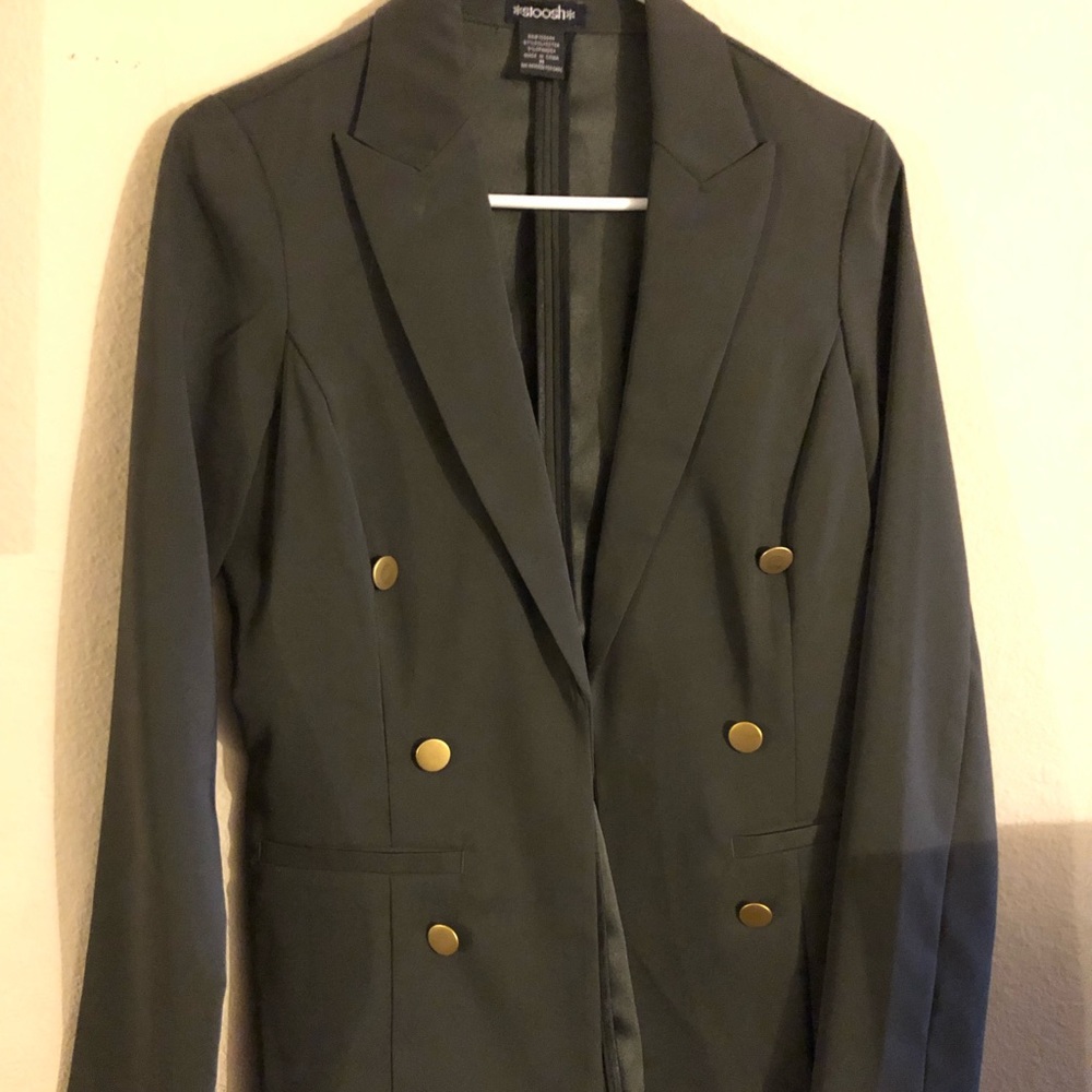 Coat with golden details